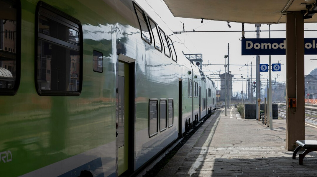 Swiss train arriving at a regional railway platform