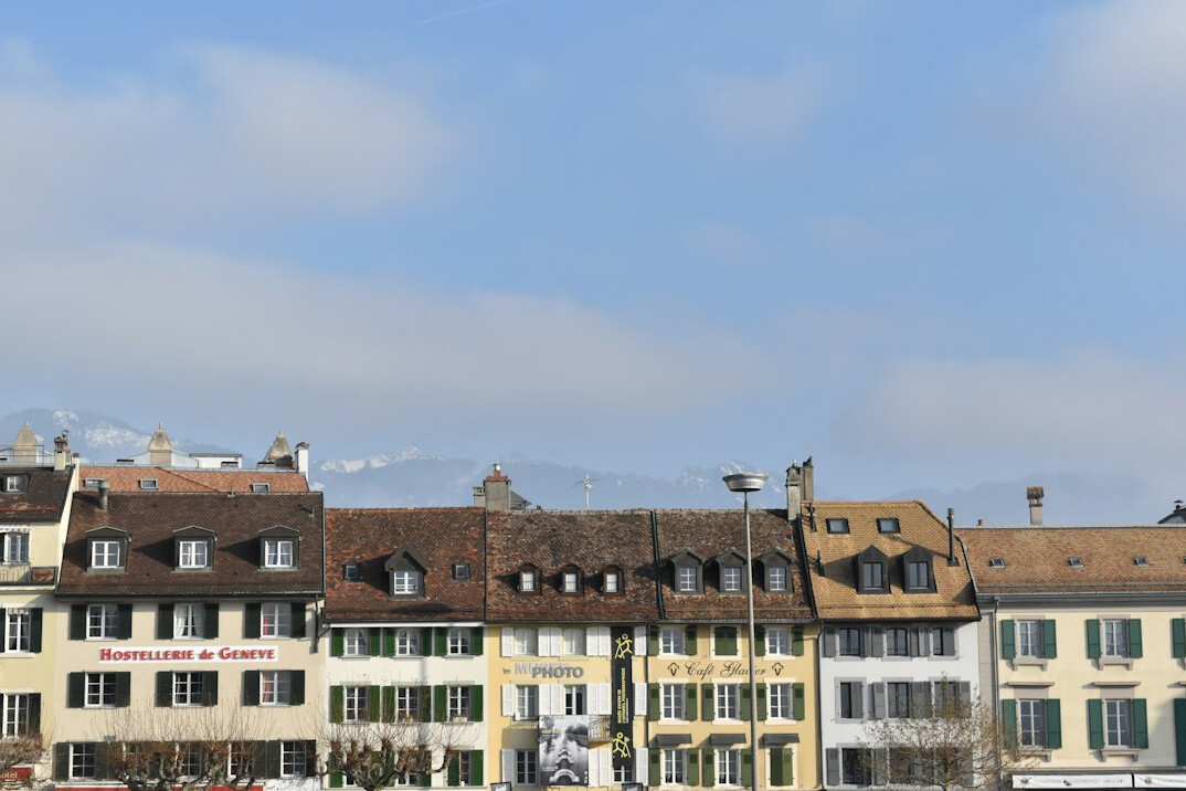 Row of Swiss residential apartment buildings facades