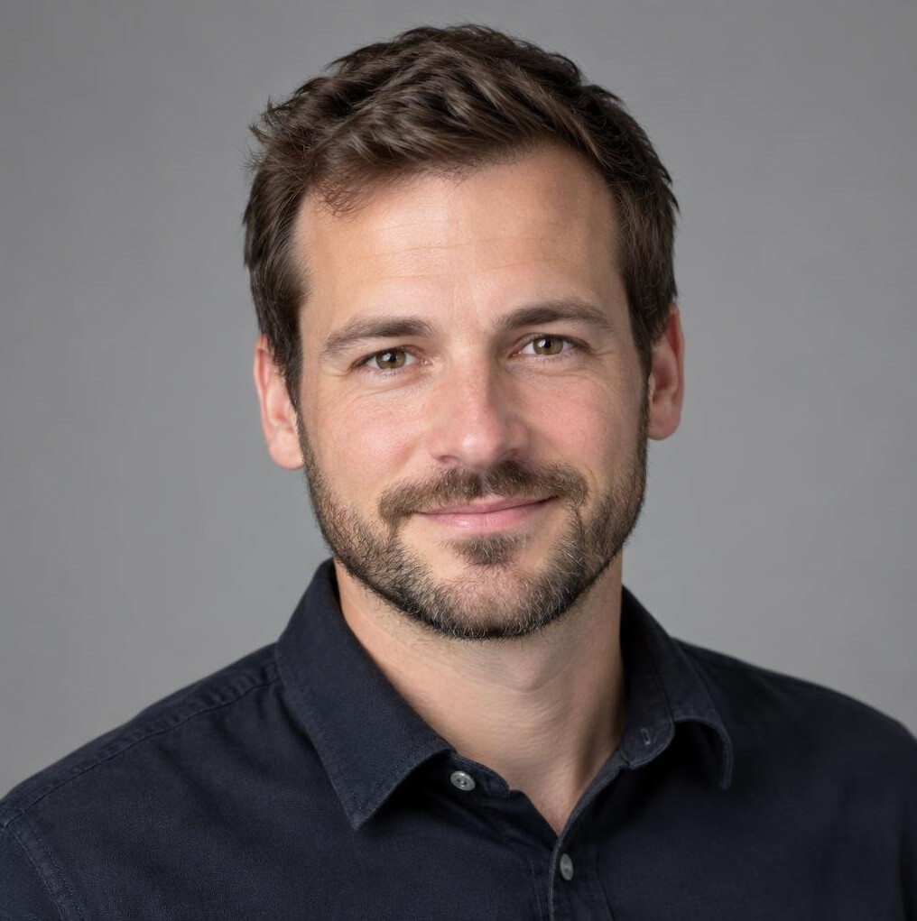Studio portrait of a male editor in his 30s