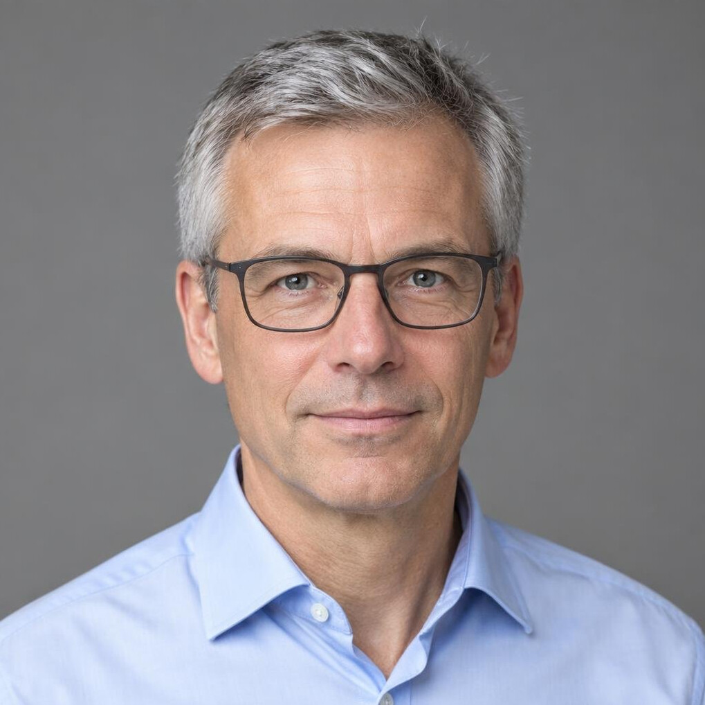 Studio portrait of a Swiss male investigative reporter in his 50s